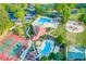 Aerial view of community amenities with pools, tennis, basketball and a playground at 708 Players Ct, Woodstock, GA 30189