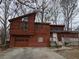 Charming two-story home with a wooden deck, garage and paved driveway at 805 Wayside Dr, Lawrenceville, GA 30046