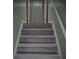 Carpeted stairway that goes upstairs to the second level of the home at 805 Wayside Dr, Lawrenceville, GA 30046