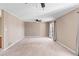 Bright and airy living room featuring neutral colors and a ceiling fan at 3222 Bay View Dr, Jonesboro, GA 30236