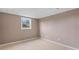 Neutral room shows a small window and base molding at 3222 Bay View Dr, Jonesboro, GA 30236