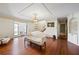 Spacious living room featuring hardwood floors and elegant built-in shelving at 5245 Emmett Still Rd, Loganville, GA 30052