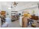 Large storage room with vaulted ceiling, ceiling fans, and multiple windows for natural light at 5245 Emmett Still Rd, Loganville, GA 30052