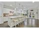 Open kitchen featuring a large island with seating and modern fixtures at 167 Marlow Dr, Woodstock, GA 30188