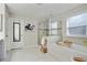 Luxurious main bathroom with a glass shower, soaking tub, and a neutral color palette at 167 Marlow Dr, Woodstock, GA 30188
