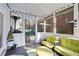 An enclosed porch area leads to the backyard patio, perfect for enjoying the outdoors at 167 Marlow Dr, Woodstock, GA 30188