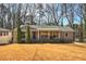 Charming single-story home with well-manicured lawn and inviting curb appeal at 1988 Boulderview Se Dr, Atlanta, GA 30316