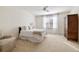 Cozy bedroom featuring natural light and neutral walls, and comfortable seating at 2146 Wolbert Trl, Marietta, GA 30062