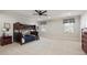 Spacious ' bedroom with neutral carpet, a ceiling fan, and a wood bunk bed at 2146 Wolbert Trl, Marietta, GA 30062