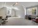 Neutral bonus room featuring 2 windows, 2 doors, and carpeted floors at 2146 Wolbert Trl, Marietta, GA 30062