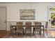 Elegant dining room with seating for eight and a stylish light fixture at 2146 Wolbert Trl, Marietta, GA 30062