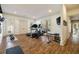 Well-equipped exercise room with wood-look flooring, a treadmill, weight bench, and ample space at 2146 Wolbert Trl, Marietta, GA 30062
