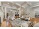 Spacious living room with hardwood floors, coffered ceiling, and ample seating at 2146 Wolbert Trl, Marietta, GA 30062