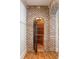 A wine cellar with arched doorway and wrought iron gate at 2146 Wolbert Trl, Marietta, GA 30062