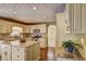 Bright kitchen featuring an island, stainless steel appliances, and hardwood floors at 596 Whitby Dr, Douglasville, GA 30134