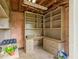 Unfinished basement with built in shelving and cabinets for all your storage needs at 1870 Shoreline Trce, Grayson, GA 30017