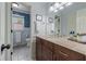 Charming bathroom with a wooden vanity and neutral paint at 1870 Shoreline Trce, Grayson, GA 30017