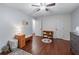 Bedroom featuring hardwood floors and neutral paint at 1870 Shoreline Trce, Grayson, GA 30017