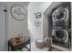Laundry area with stacked washer and dryer at 1870 Shoreline Trce, Grayson, GA 30017