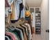 Large walk-in closet features custom shelving and storage, great for organization at 1870 Shoreline Trce, Grayson, GA 30017