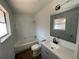 Bathroom featuring a modern vanity, a bathtub with shower and contemporary finishes at 3417 Hollow Tree Dr, Decatur, GA 30034