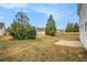 Wide shot of backyard showing a patio with a view of mature trees at 4872 Antelope Cv, Atlanta, GA 30349