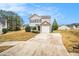 Inviting two-story home featuring well-manicured landscaping and a spacious driveway at 4872 Antelope Cv, Atlanta, GA 30349