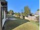 Spacious backyard featuring lush green grass and a privacy fence at 690 Avalon Forest Dr, Lawrenceville, GA 30044