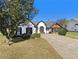 Beautiful single-story home featuring a well-manicured lawn and inviting curb appeal at 690 Avalon Forest Dr, Lawrenceville, GA 30044