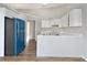 Bright kitchen with white cabinetry, modern countertops, and stainless steel appliances at 690 Avalon Forest Dr, Lawrenceville, GA 30044