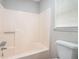 Full bathtub with shower at 372 Rustic Ridge Cir, Lawrenceville, GA 30043