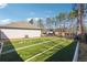 View of backyard turf, gazebo, and side of the house, creating outdoor living space at 1243 Old Villa Rica Rd, Dallas, GA 30157