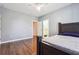 Bedroom with hardwood floors and a ceiling fan for added comfort at 1243 Old Villa Rica Rd, Dallas, GA 30157