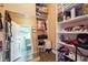 Walk-in closet with mirror and shelving units at 1243 Old Villa Rica Rd, Dallas, GA 30157