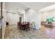Open-concept dining room with a large table and easy access to living area at 1243 Old Villa Rica Rd, Dallas, GA 30157