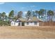 Attractive home with a welcoming entrance and well-manicured lawn at 1243 Old Villa Rica Rd, Dallas, GA 30157