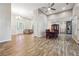 Spacious open floor plan showcases a formal living area, dining room, and beautiful wood flooring at 1243 Old Villa Rica Rd, Dallas, GA 30157