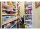 Walk-in pantry provides ample storage with shelving for food and household items at 1243 Old Villa Rica Rd, Dallas, GA 30157
