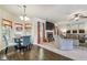 Inviting living room featuring a fireplace, hardwood floors, and plenty of natural light at 4357 Kershaw Dr, Snellville, GA 30039