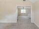 A bright bonus room with neutral carpeting and a vaulted ceiling at 116 Black Oak Ct, Stockbridge, GA 30281