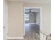 View to the living room from the kitchen, features a fireplace and large windows at 116 Black Oak Ct, Stockbridge, GA 30281