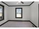 Cozy bedroom with a ceiling fan, natural light, and neutral carpeting at 391 S Bend Se Ave, Atlanta, GA 30315