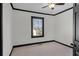 Bedroom featuring neutral carpeting, black trim, and an abundance of light at 391 S Bend Se Ave, Atlanta, GA 30315