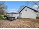 A backyard featuring a deck, perfect for outdoor entertaining and relaxation at 441 Village Way, Lawrenceville, GA 30046