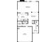 First floor floorplan featuring the living area, kitchen, and garage at 11143 Aliyah Dr, Hampton, GA 30228