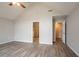 Spacious primary bedroom featuring a high vaulted ceiling and hardwood floors at 11143 Aliyah Dr, Hampton, GA 30228