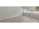 Clean bedroom featuring new floors, natural light, and a neutral color scheme ready for personalization at 1808 Brewer Sw Blvd, Atlanta, GA 30310