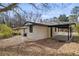 Backyard view of home with carport at 1808 Brewer Sw Blvd, Atlanta, GA 30310