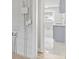 View of laundry room with cabinets and stainless steel sink at 1808 Brewer Sw Blvd, Atlanta, GA 30310