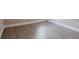 Neutral bedroom featuring modern gray flooring and bright white baseboards at 4950 Summersun Dr, Morrow, GA 30260